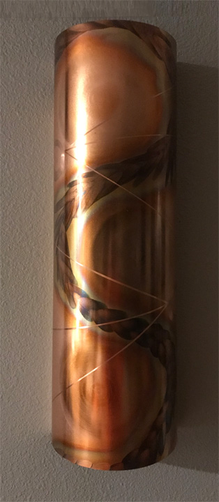 Soaring wall sconce